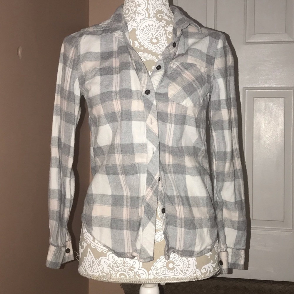 Woman’s button down plaid shirt